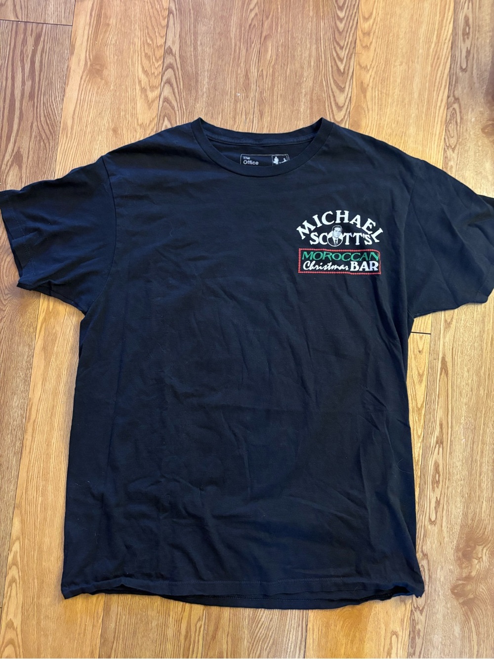Black 'Michael Scott's Moroccan Christmas Bar' Graphic T-Shirt The Office Merch